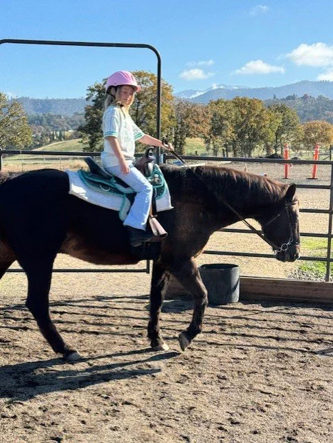 Sadie riding Hickory.jpeg