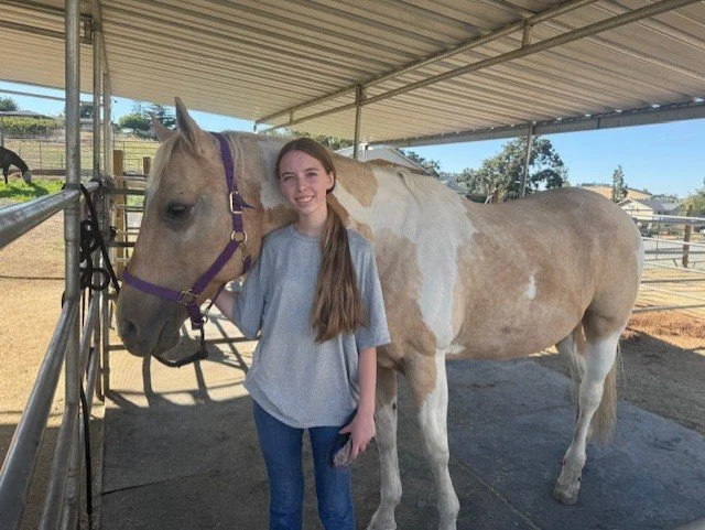 Shelby posing with Lyric.jpeg