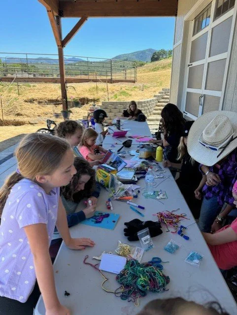 kida at craft table.jpeg