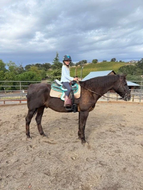 Isabella riding Hickory.jpeg