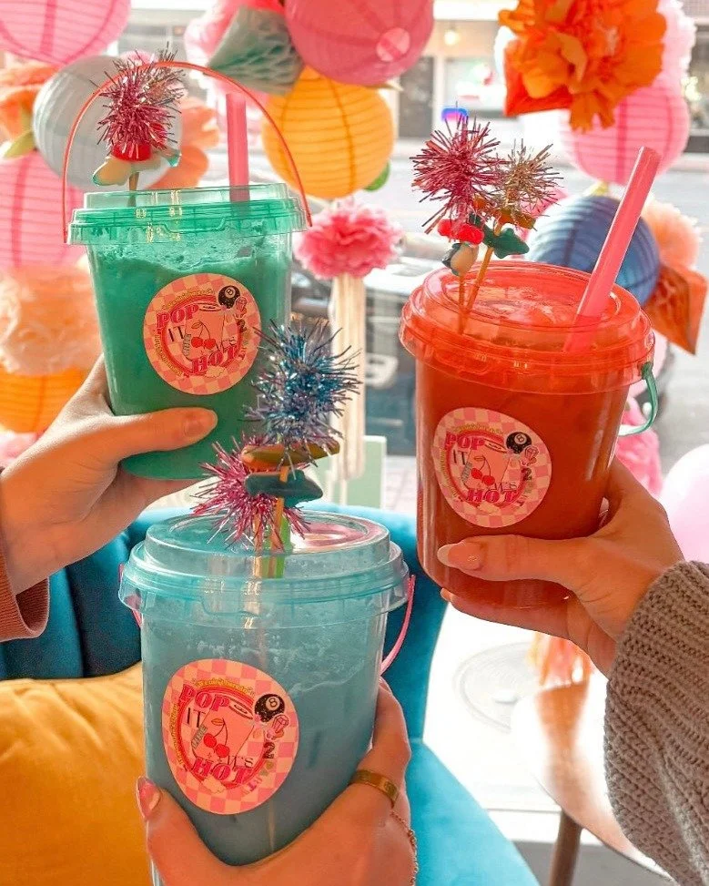 THIS SATURDAY! Grab a soda this Saturday, March 28th at our Rogers show from @pop_it_like_its_hot_dirtysoda! Pop It Like It&rsquo;s Hot will be serving up a blast from the past with a Y2K twist! Think early-2000s sparkle and bold flavors in every sip