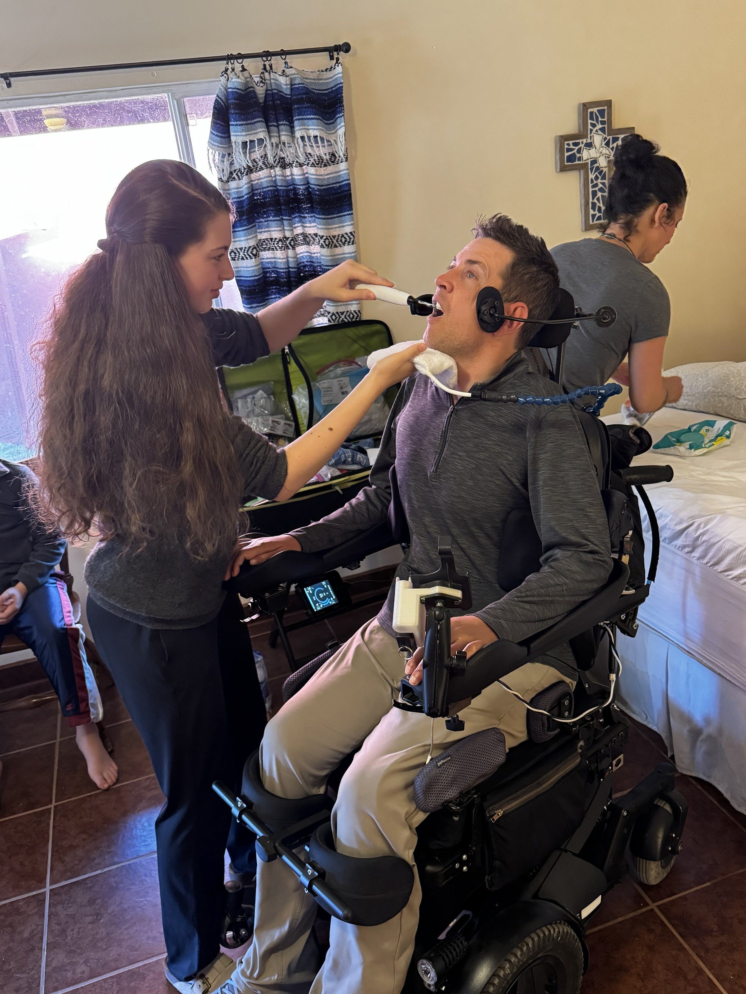 Eliana brushing Wes' teeth before bed. The Bokenkamp family was so eager to serve!