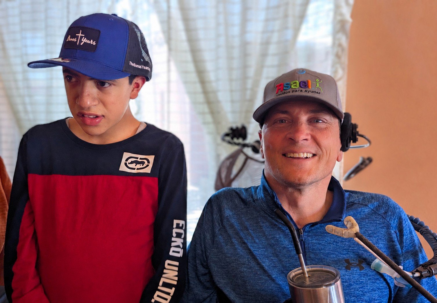 Asael Montesinos from Asael Ministries who was born with an intellectual disability with Wes after exchanging hats