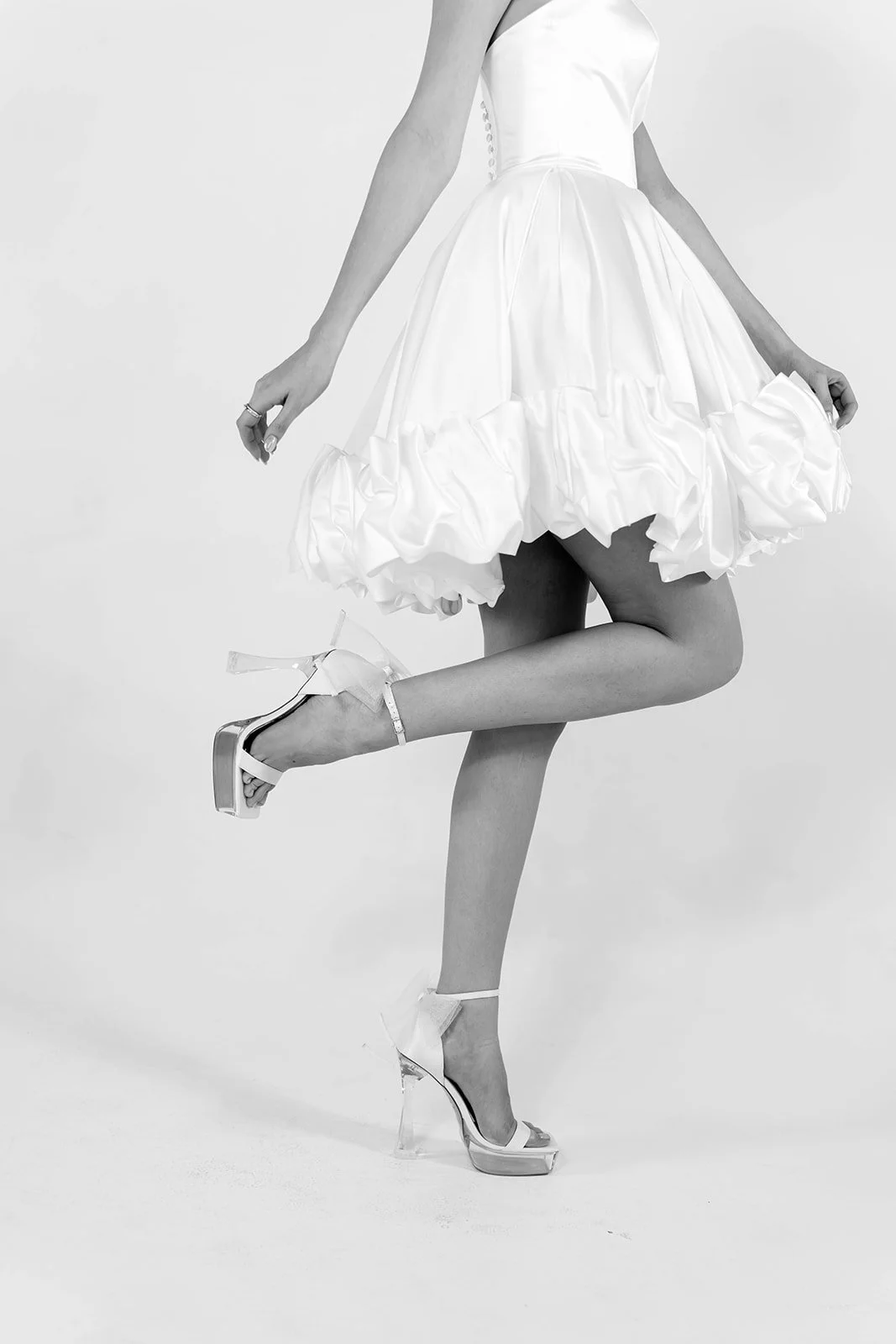 Modern bridal gown styled in a high fashion editorial at Duchess Bridal Greensboro