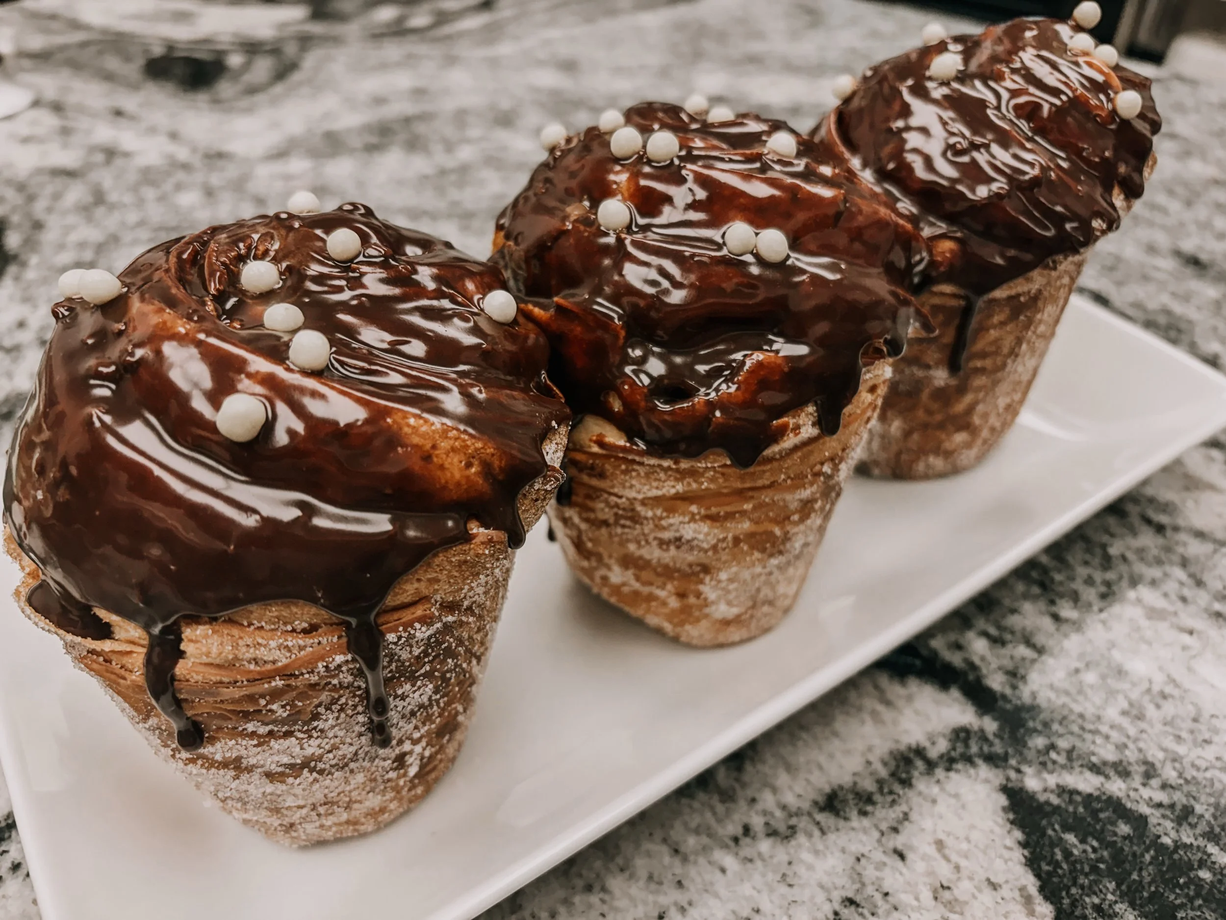Nutella cruffins anyone ?! Come see us from 10-2 !! Come escape the rain with us !! 

*or until sold out