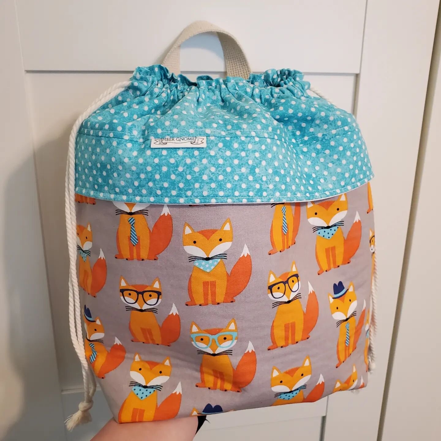 A Skulk of Foxes! New bag posting soon.

Don't you love a roomy project bag?

Aside from Stace + Nancy, this is my largest bag so far. Will hold a sweater project with ease - and then some!

Only a couple of these foxes will be available. If you can'