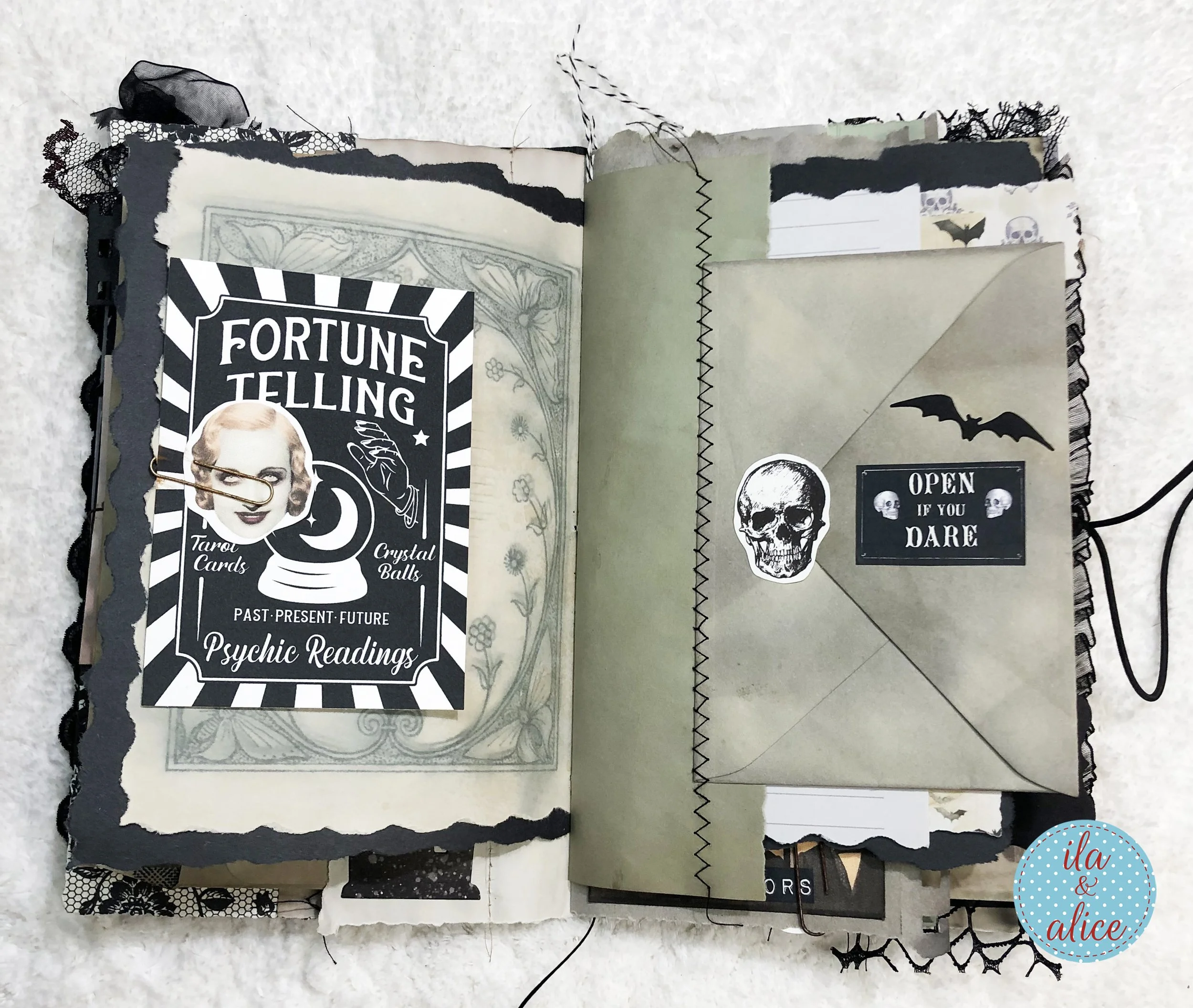 Handmade Halloween scrapbook journal with vintage fortune-telling imagery, aged papers, bats and an envelope marked Open If You Dare.
