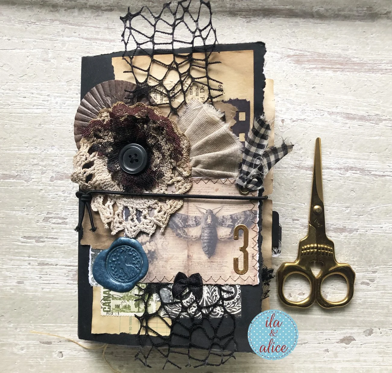 handmade spooky junk journal folio with wax seal, vintage ephemera, and dark folklore aesthetic