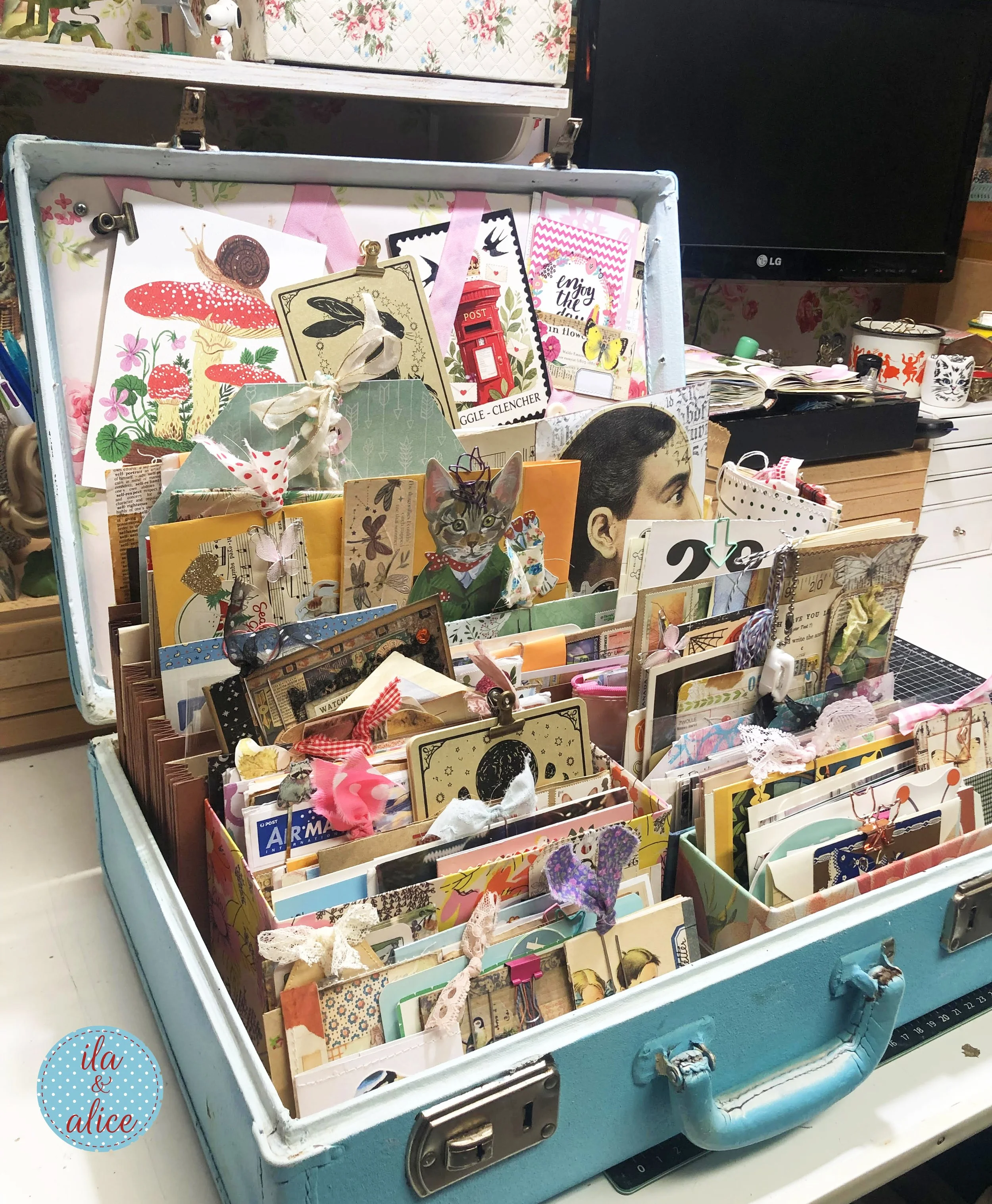 Organizing Years of Happy Mail Into a Vintage Suitcase Archive
