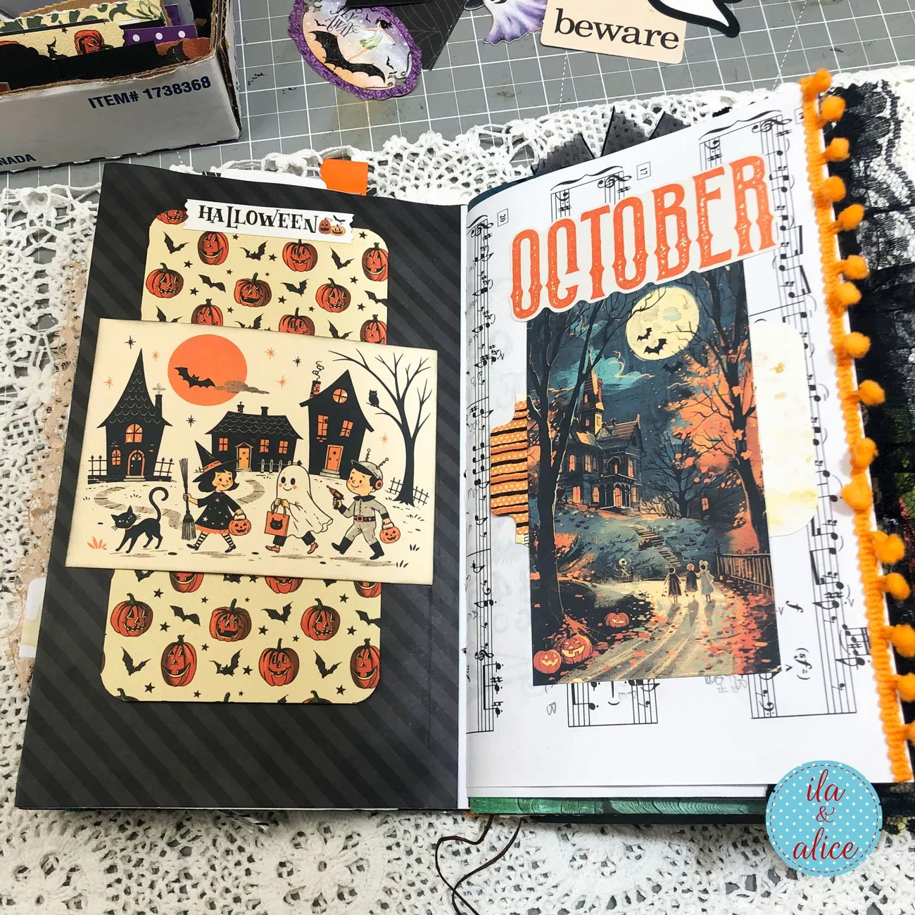 Pages Halloween junk journal spread with a vintage trick-or-treat pocket, haunted house illustration, October title and orange pompom trim