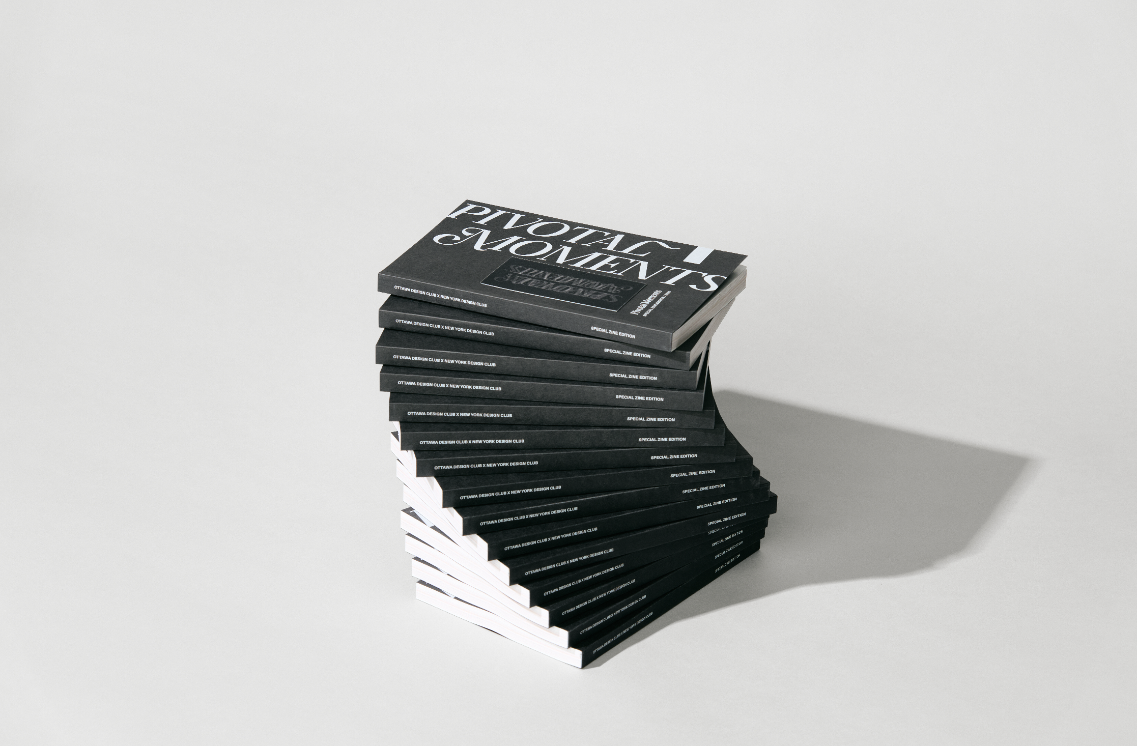 pivotal moments zine, magazine, new york design club, editorial zine, NYDC, stacked magazines, book