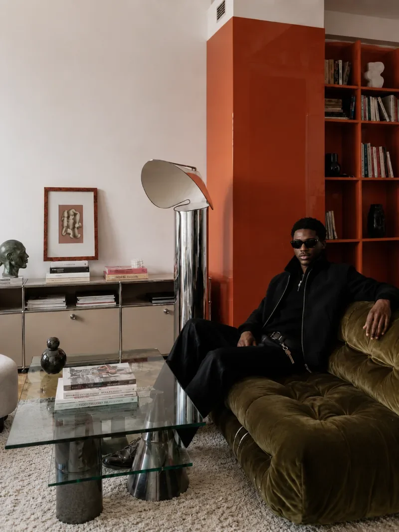 Stylish portrait of a man in a modern interior, representing personal branding photography, image consulting, and visual direction for professional presence.