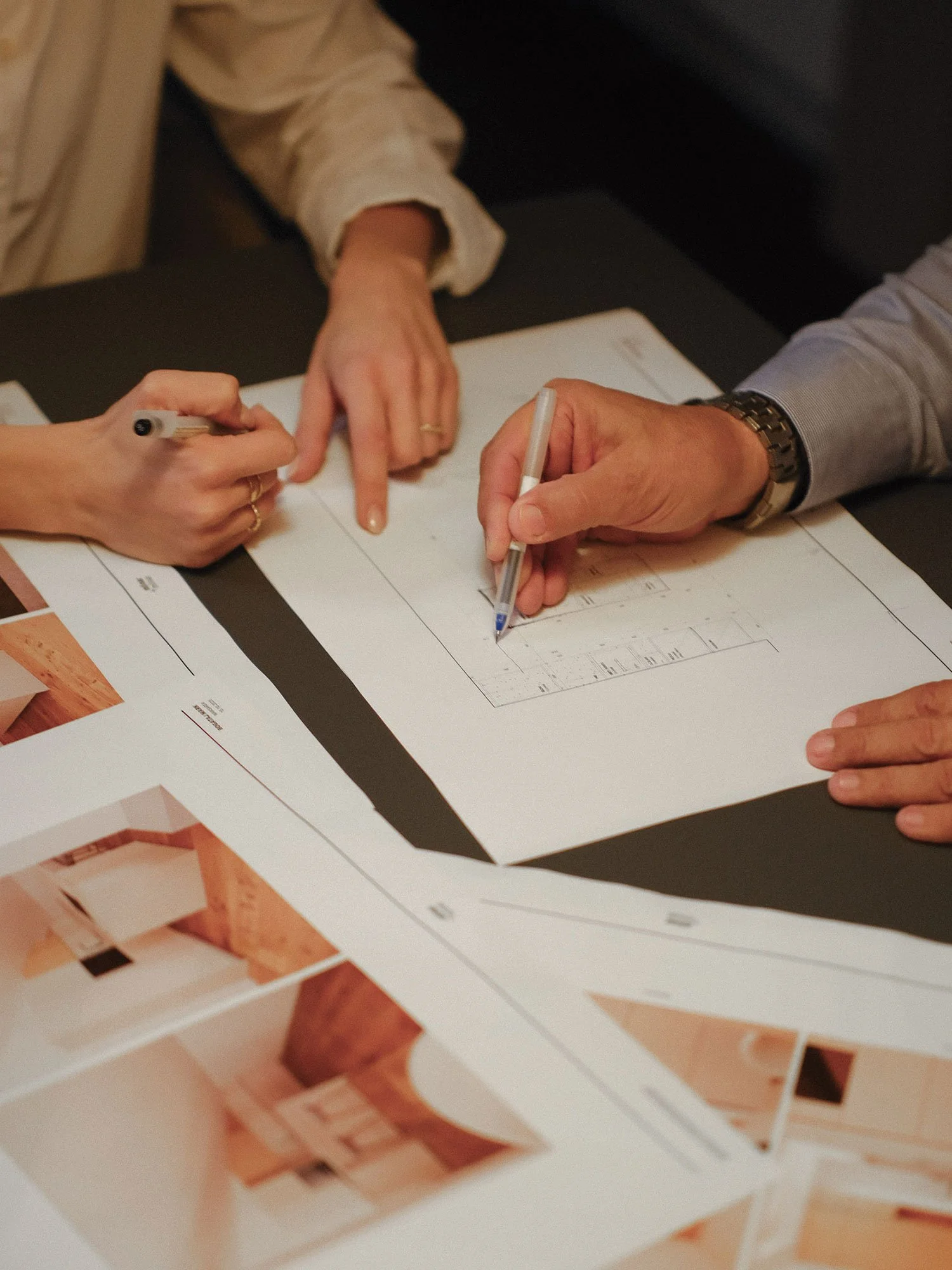 Brand photography for interior design studio hands drawing.