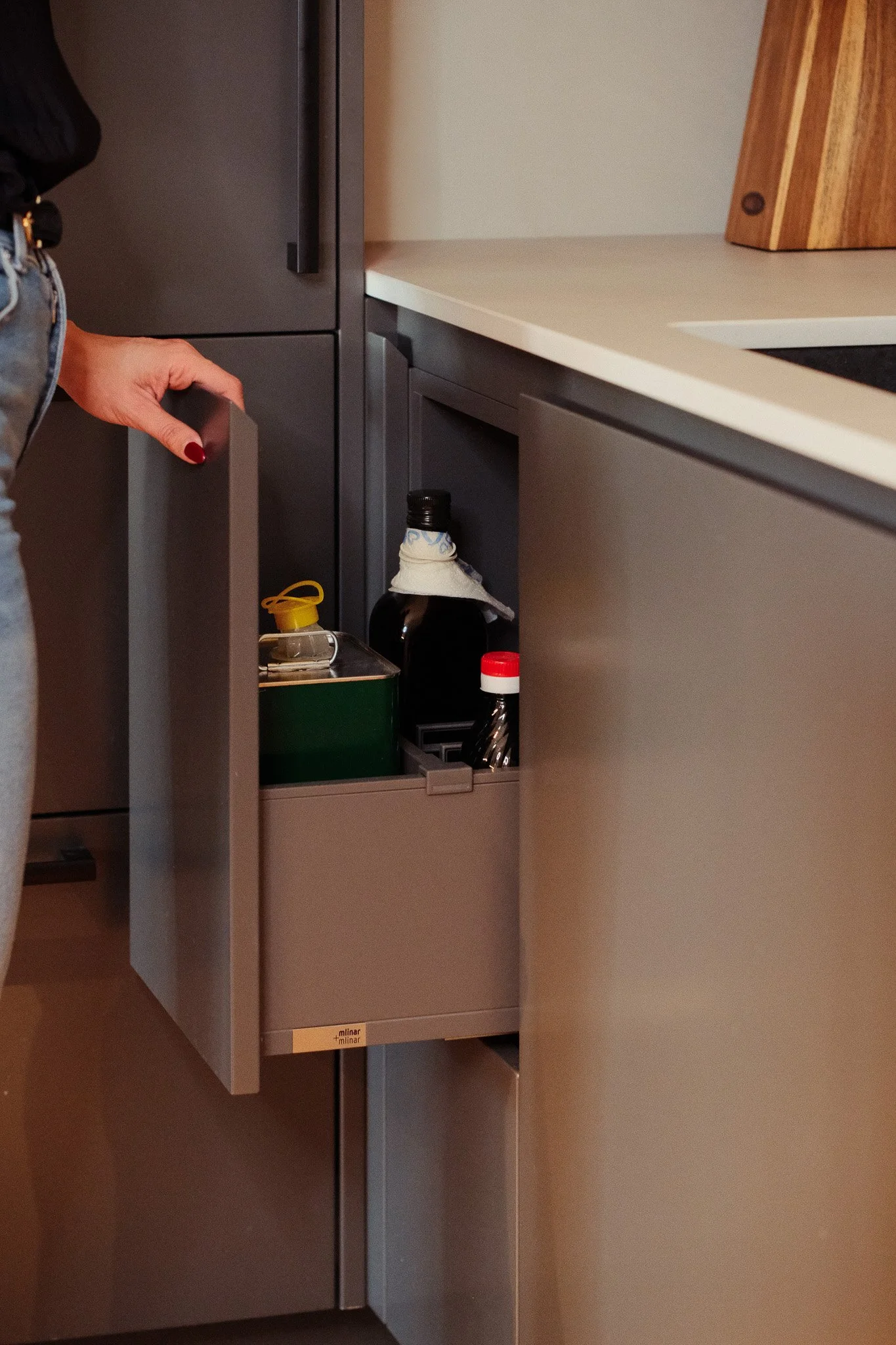 Oil, vinegar and bottle drawer in bespoke kitchen design