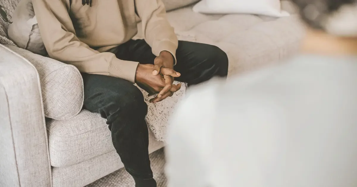 Father engaging in parenting therapy and prioritizing taking care of themselves.