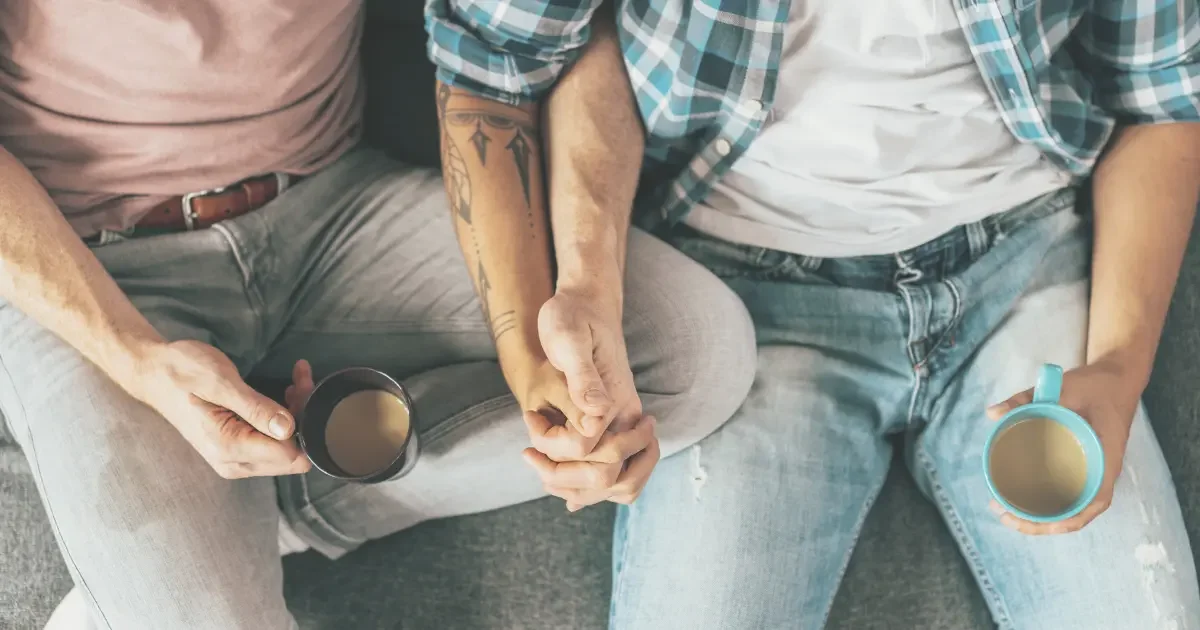 A couple holding hands as they figure out how to be masters of relationships.