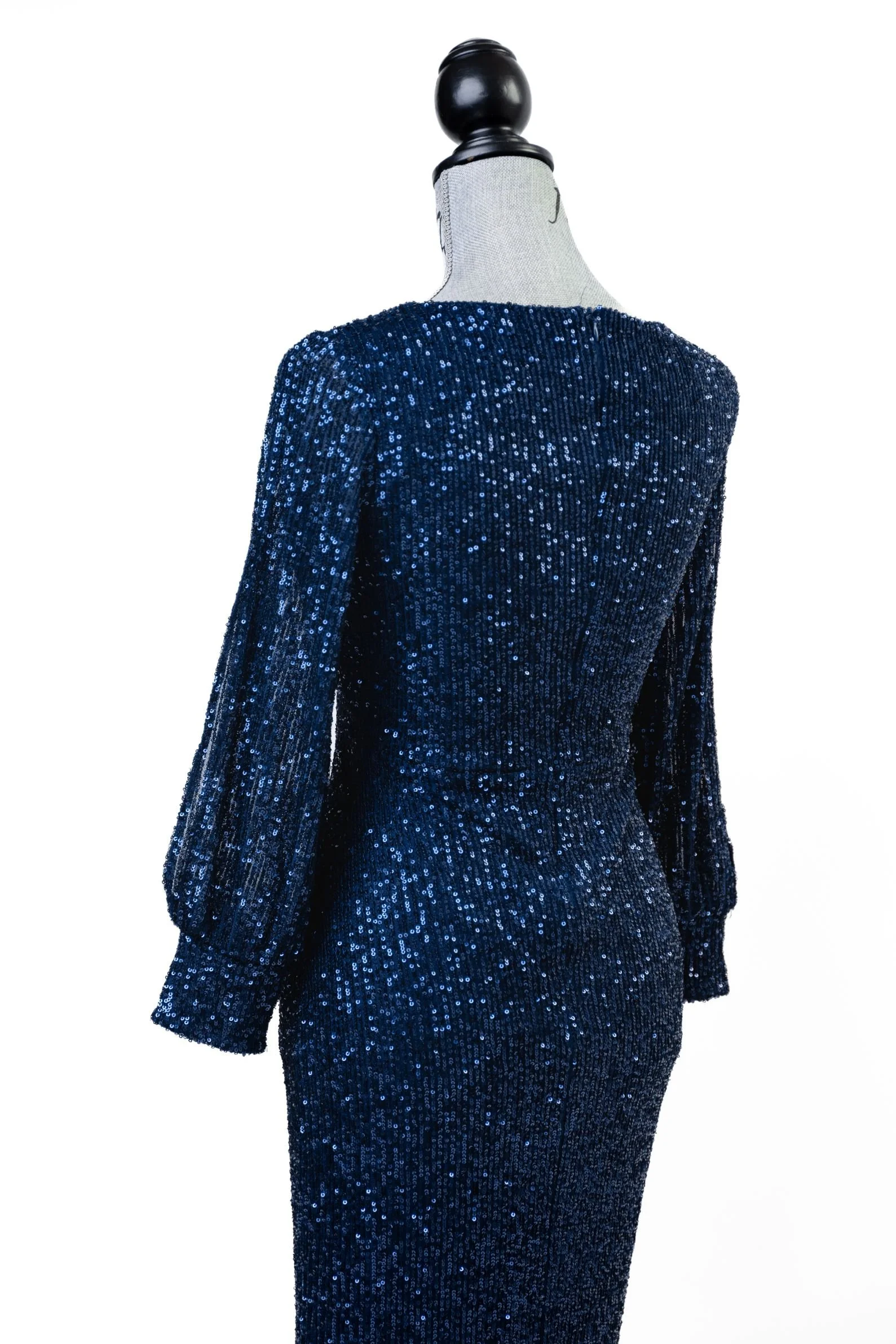 Close up back view of blue sparkly sequin dress with closed back and floor length skirt, for photoshoots in Calgary