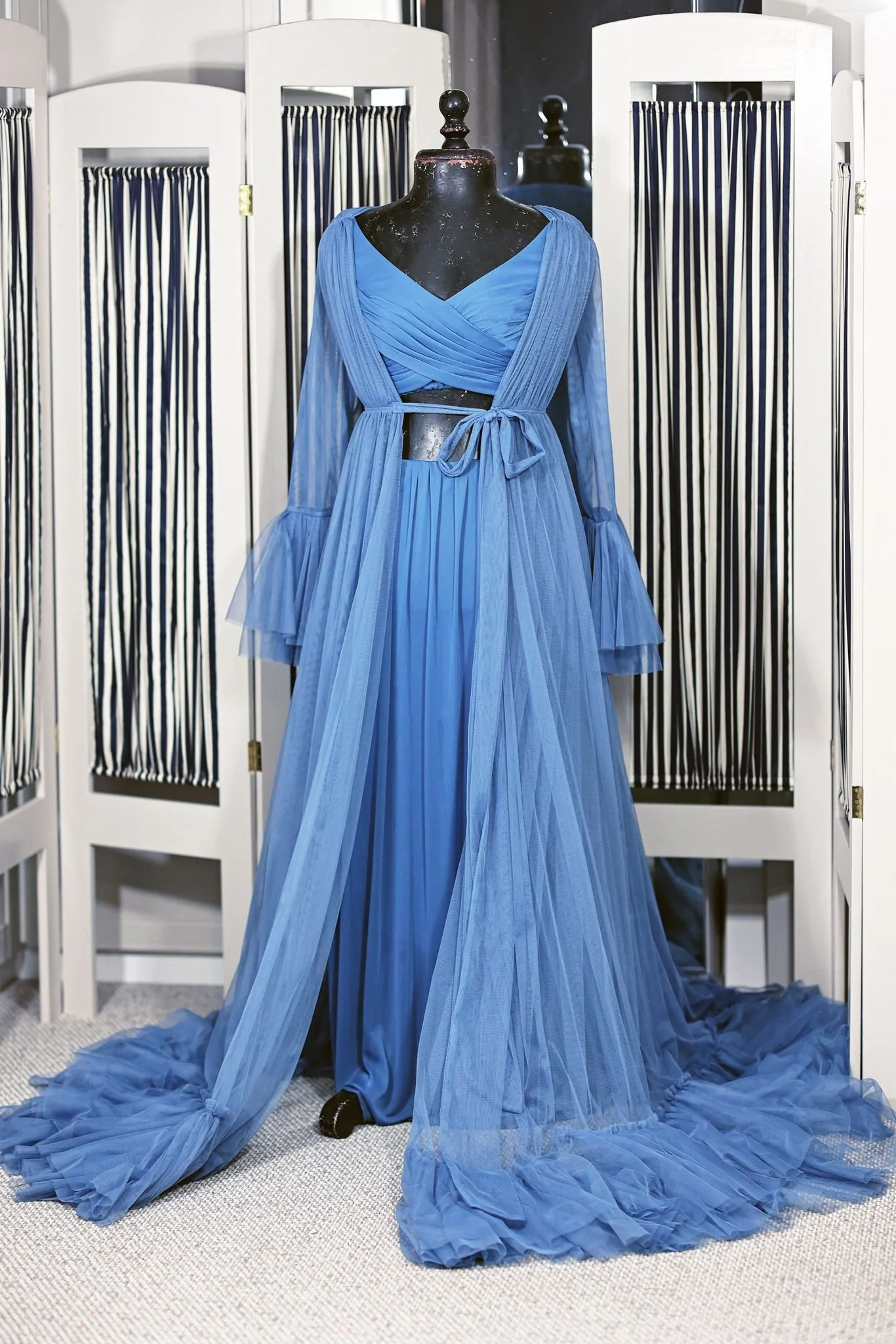 Sky blue two-piece dress with an open tummy, and an extra long blue tulle robe with long sleeves
