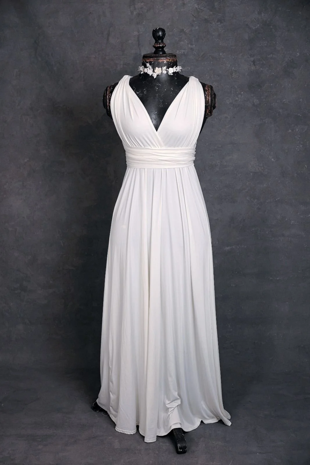 Just white infinity dress on its own with silver jewellery ribbon
