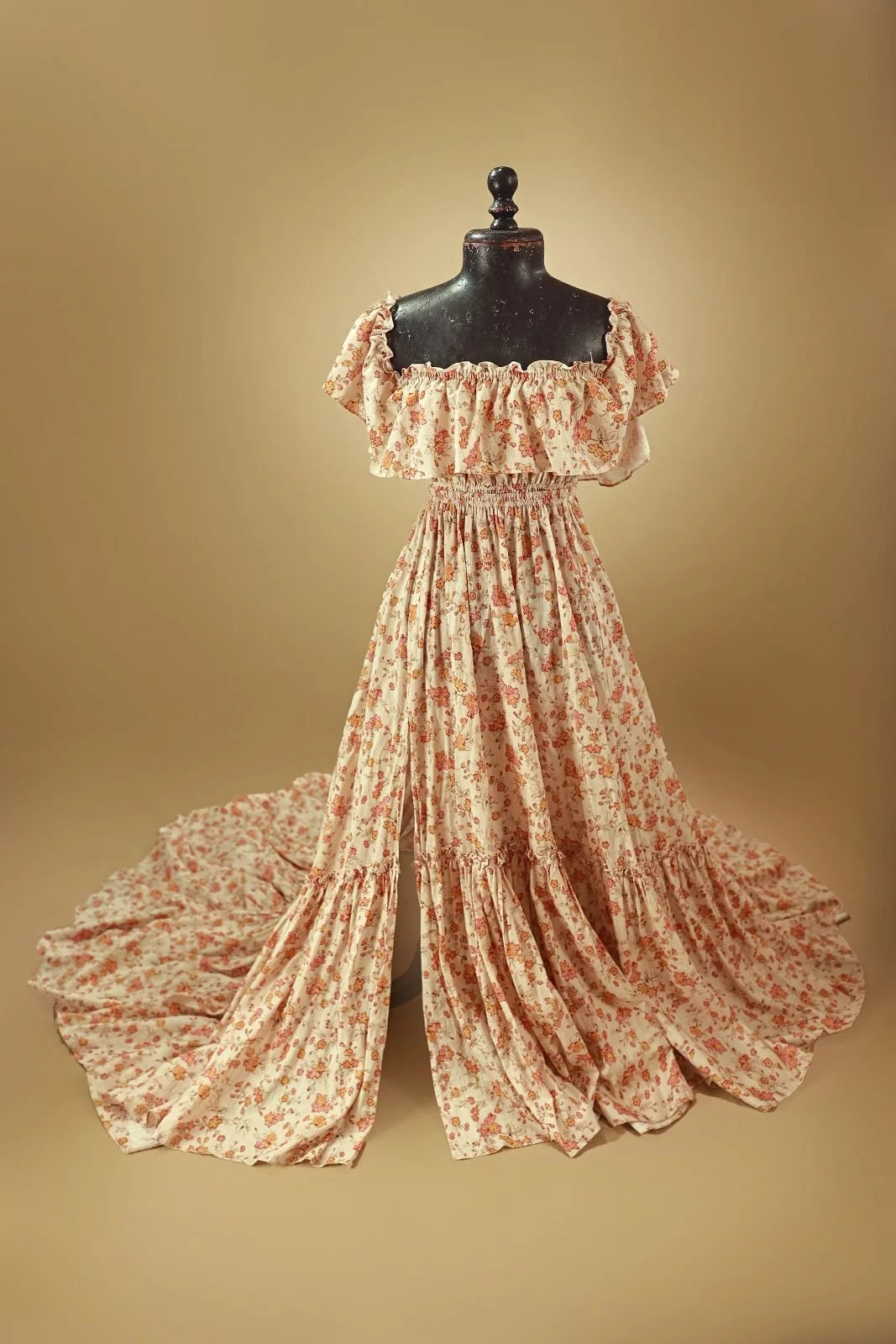 Floral cotton gown with ruffled shoulders and long skirt with side slit