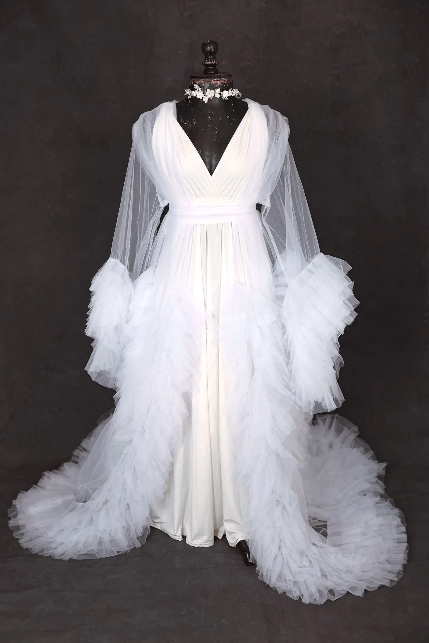 White infinity floor-length dress, with a sheer puffy textured white tulle robe overtop