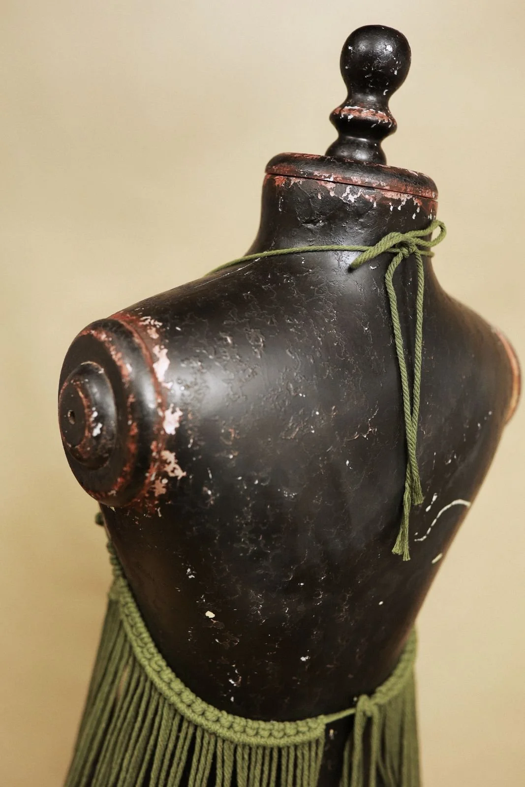 Back view of boho macrame beach dress, showing open back cut