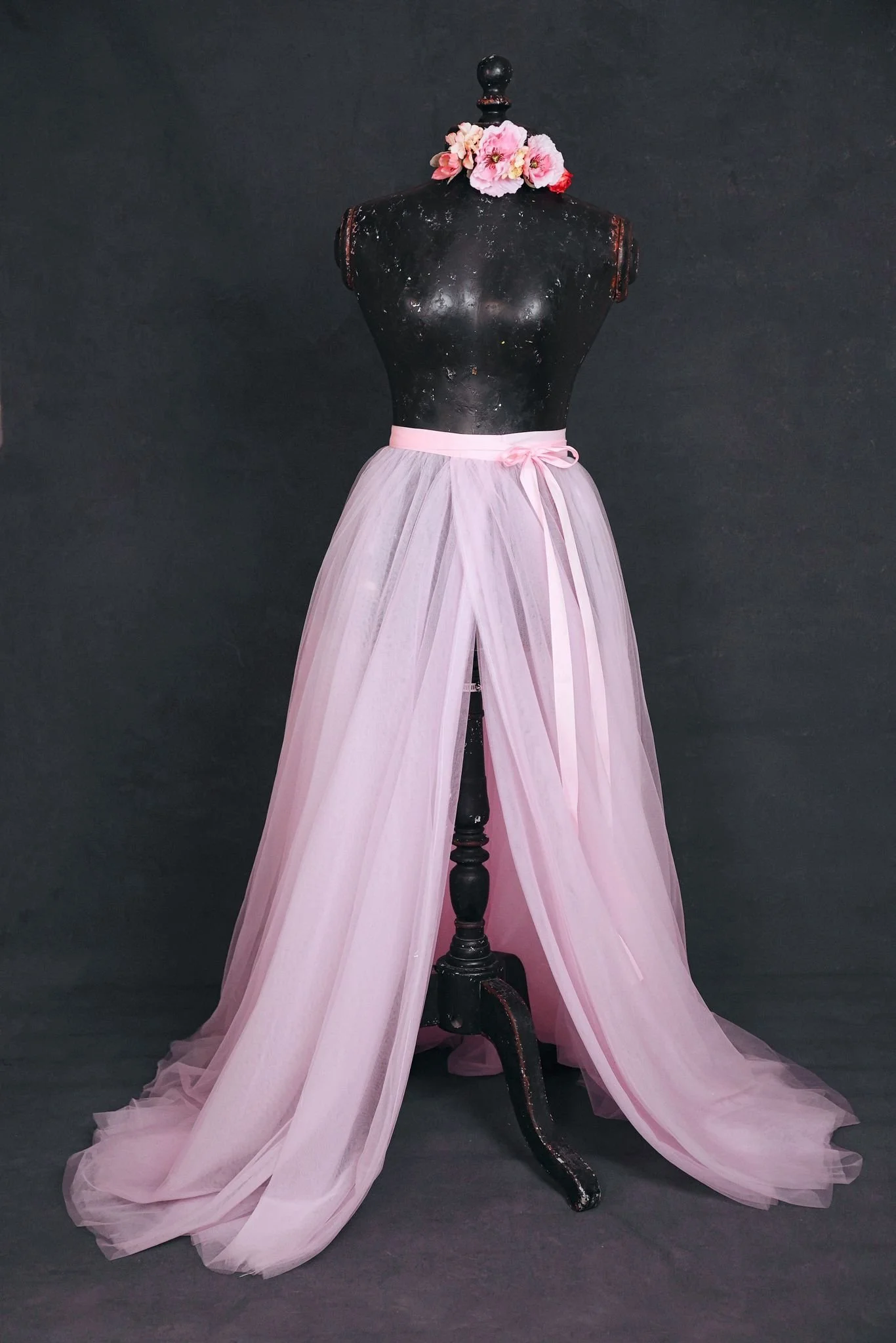 A light pink tulle skirt that can be added to any dresses in my collection