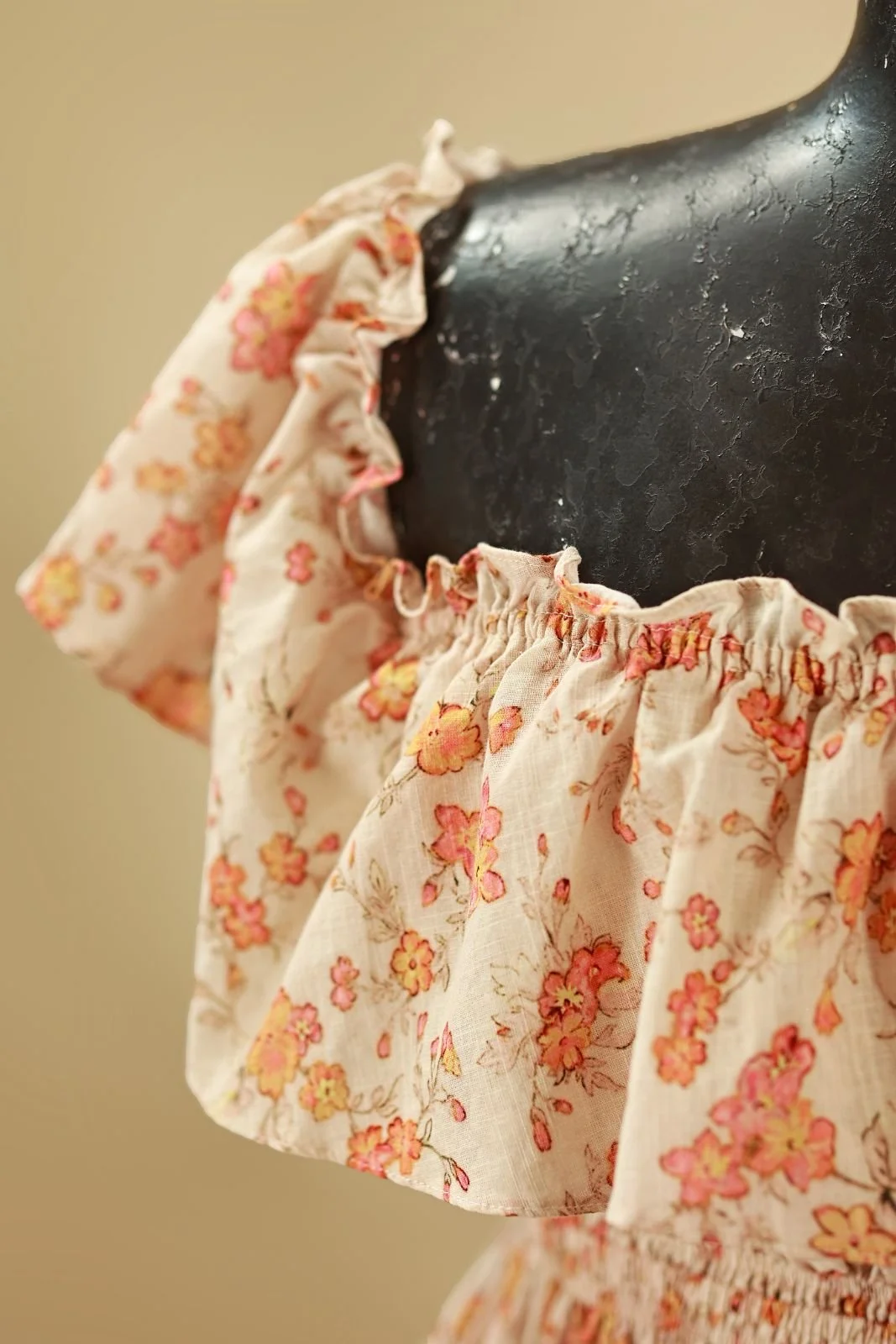 Close up of floral cotton gown shoulder