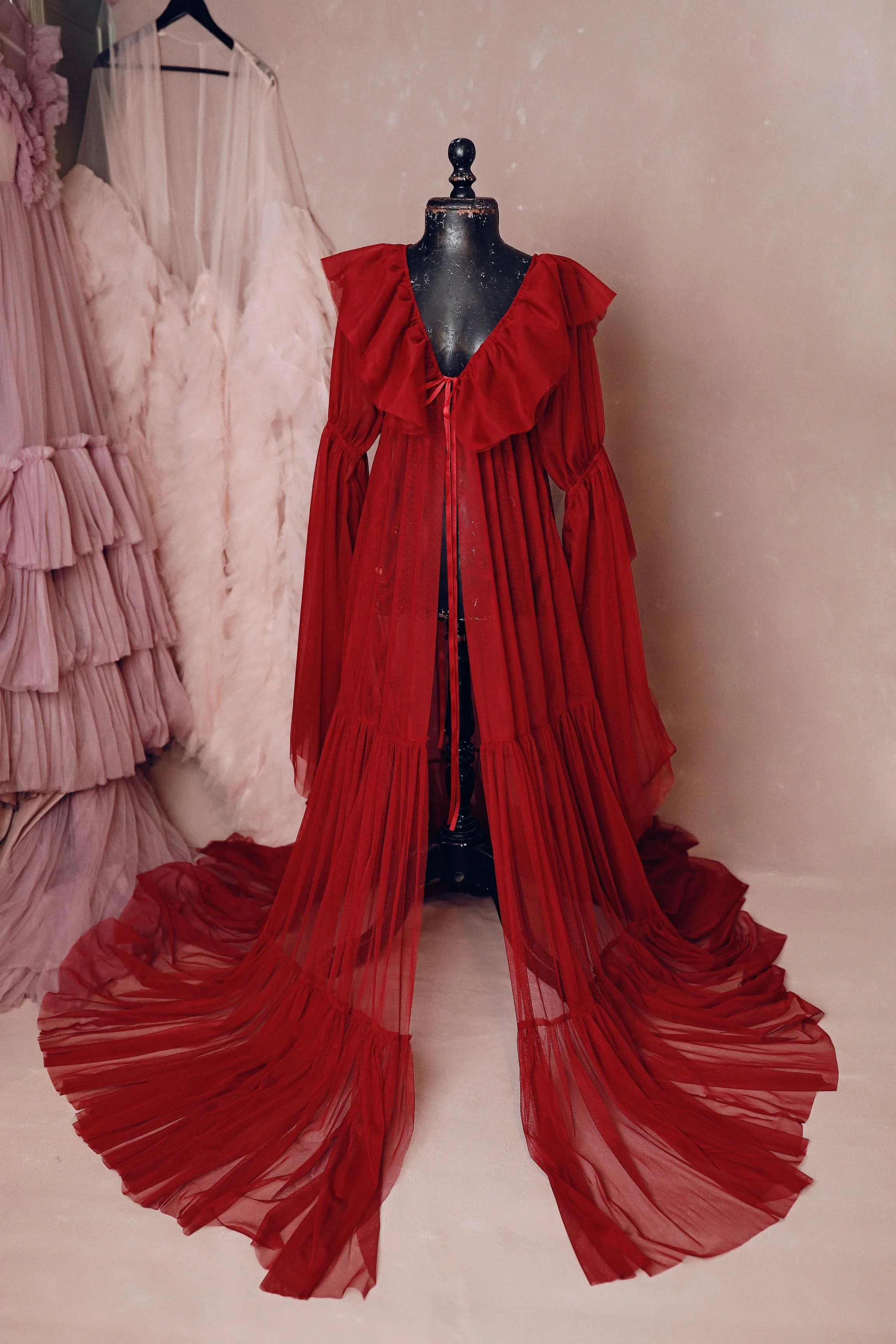 Red maternity photoshoot boudoir robe with ribbons and long floor length skirt