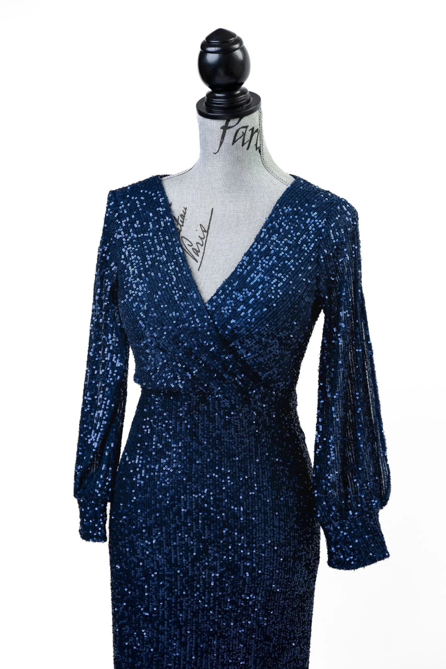 Close up view of blue sparkly sequin dress with V-neck and floor length skirt, for photoshoots in Calgary