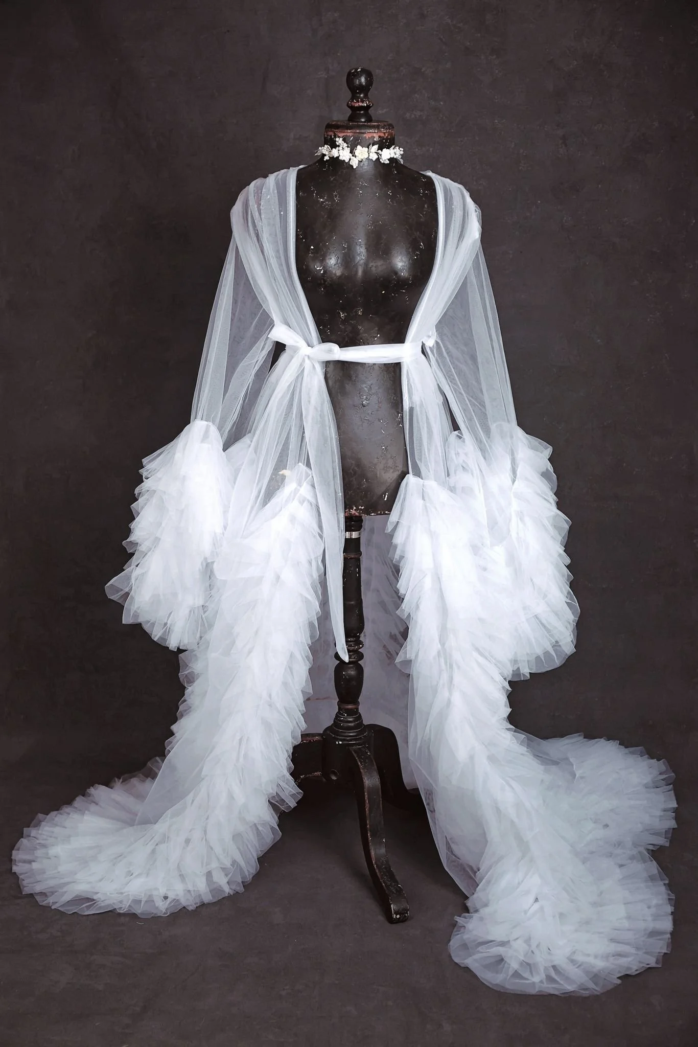 White sheer tulle floor-length robe with puffy textured sleeves