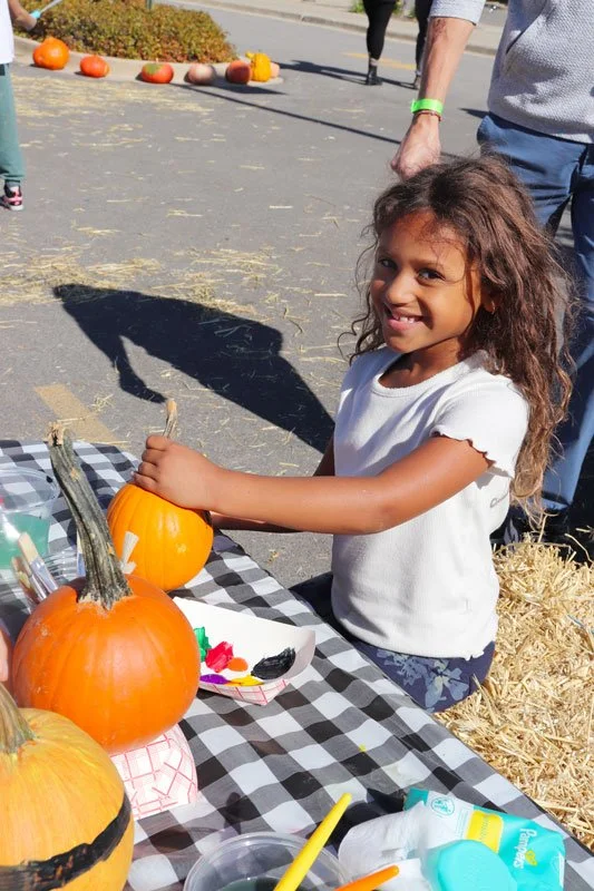 girl-painting-pumpkin.jpg