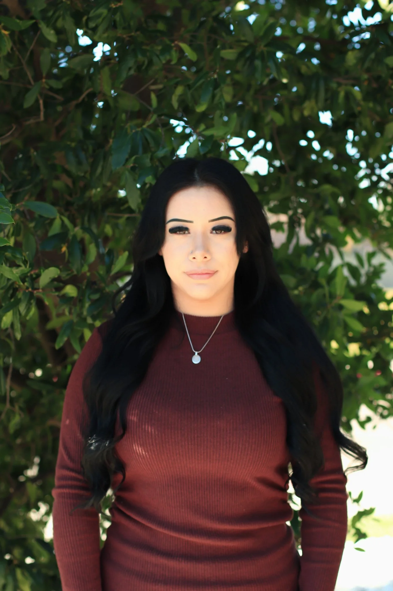 an image of Irania Hernandez smiling at the camera