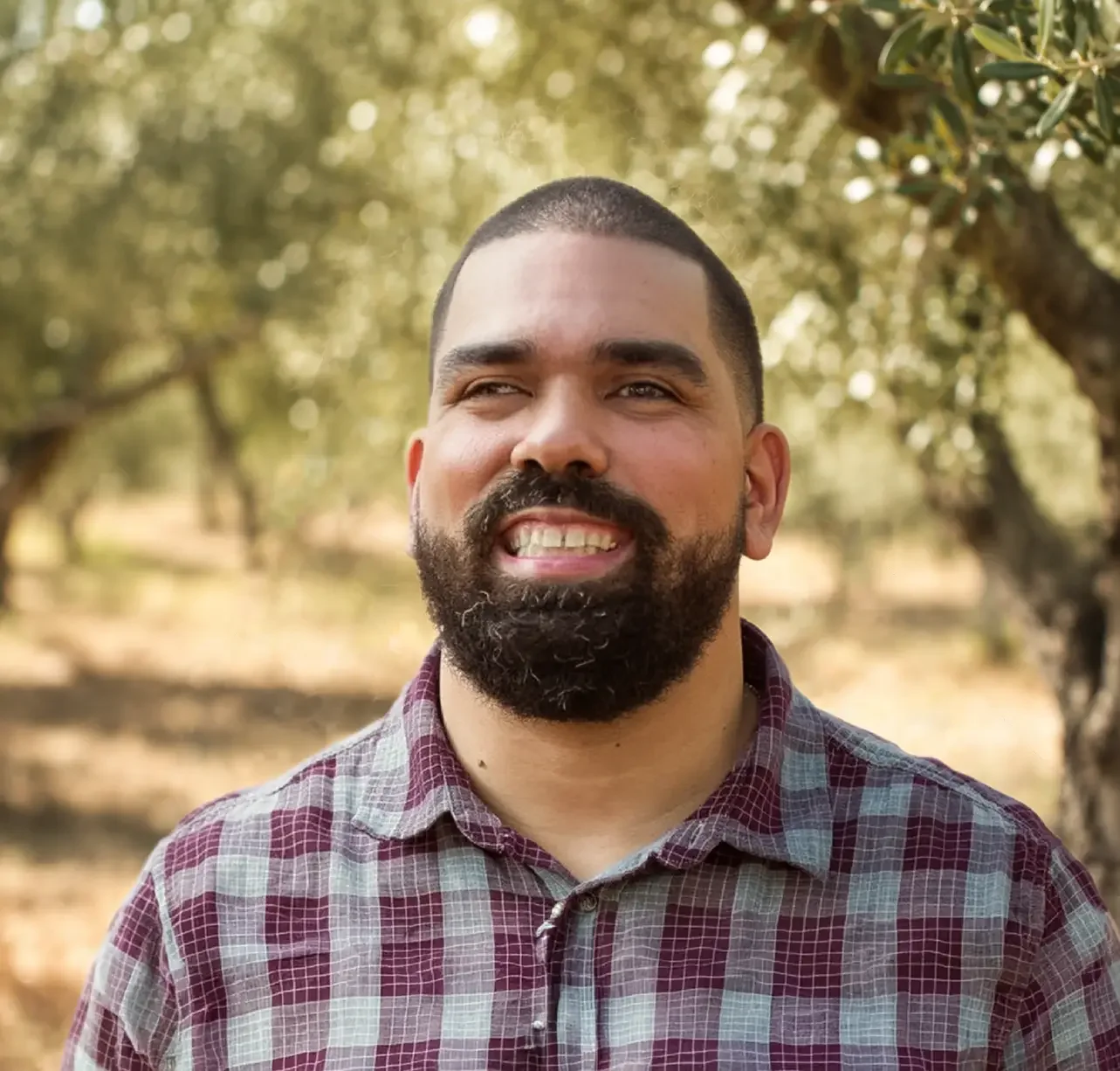 an image of Kris Salas smiling at the camera
