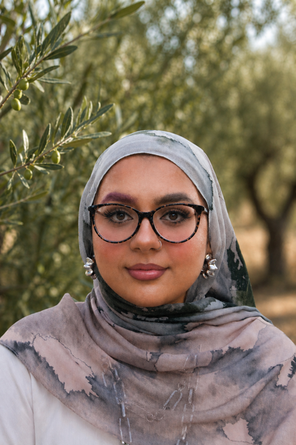 an image of Urwah Yousuf smiling at the camera