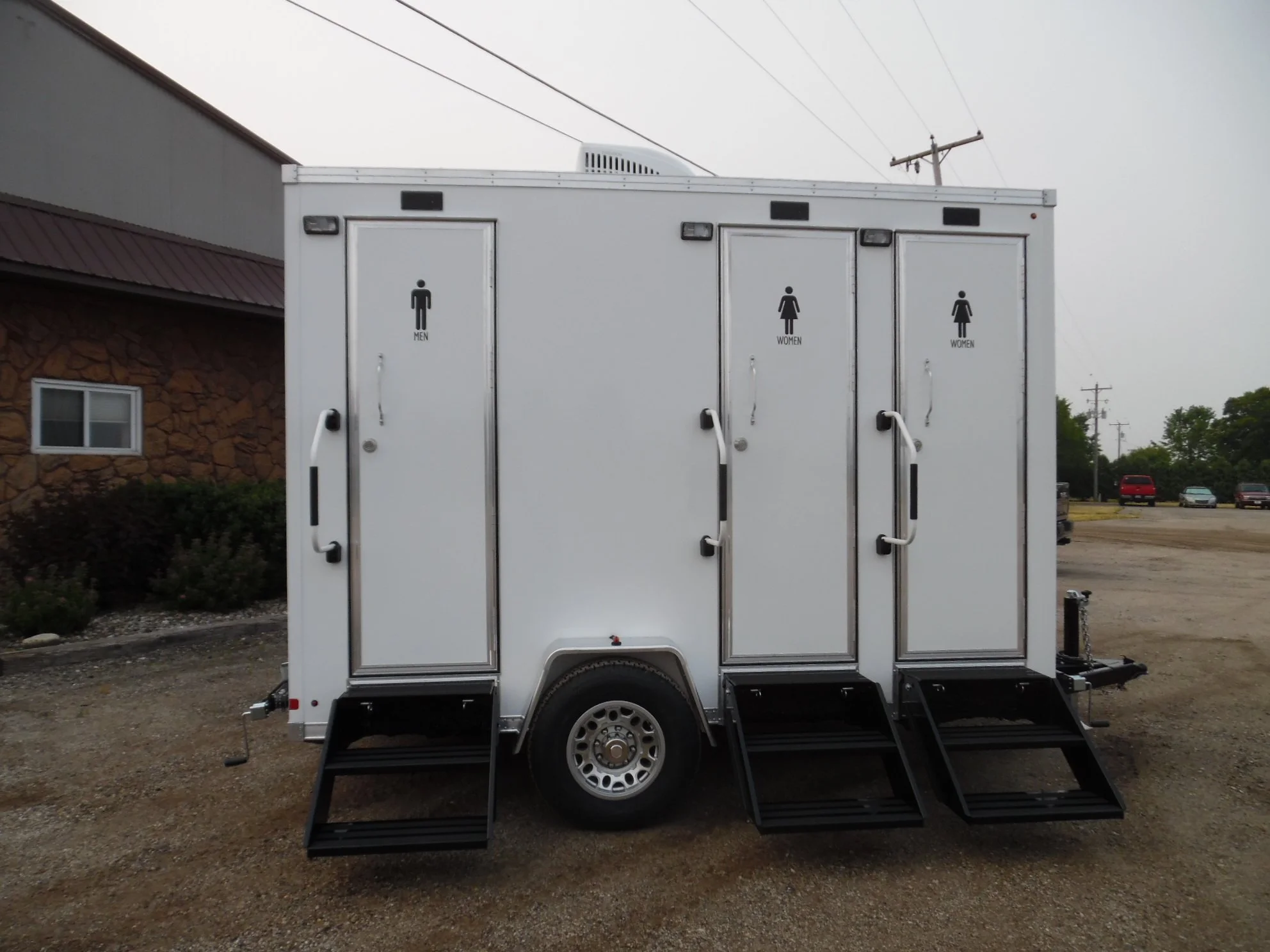 threestalltrailergallery — Cotter's Sewer, Septic & Portable Toilets