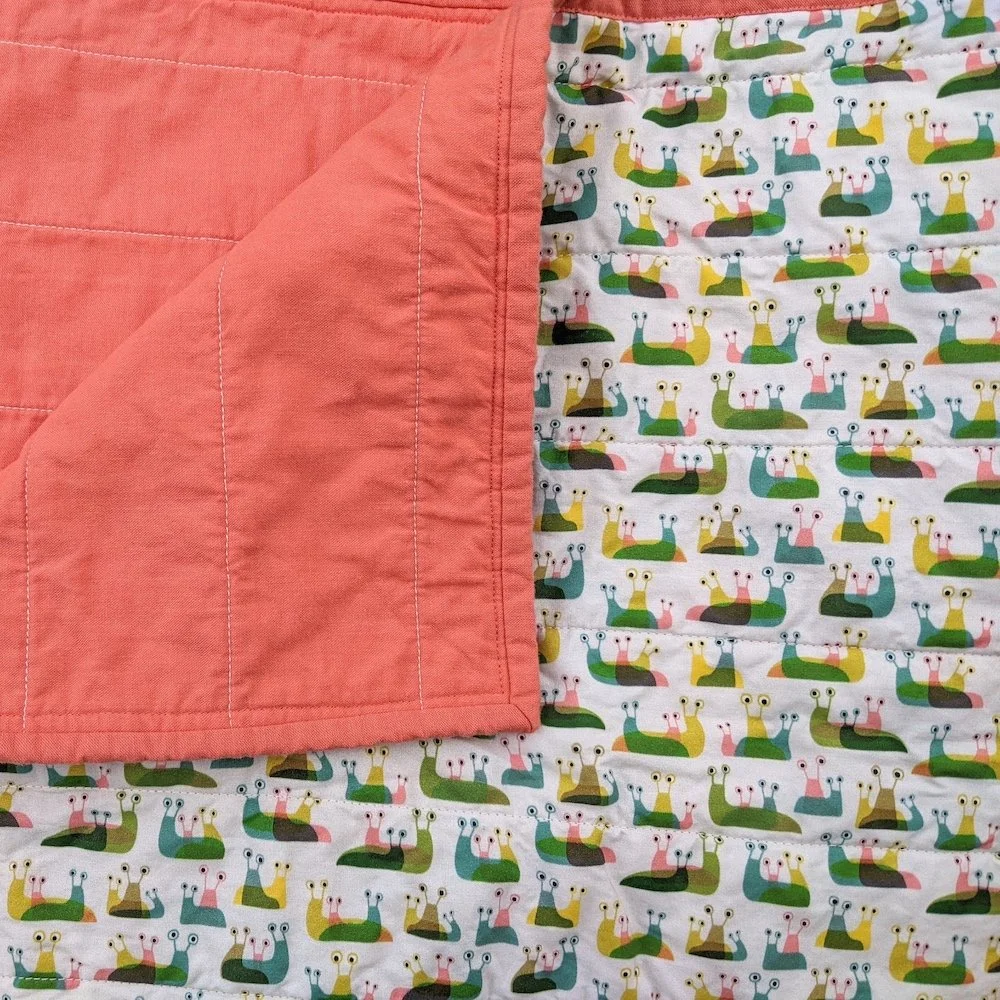 Slug Drama Baby Blanket (coral)