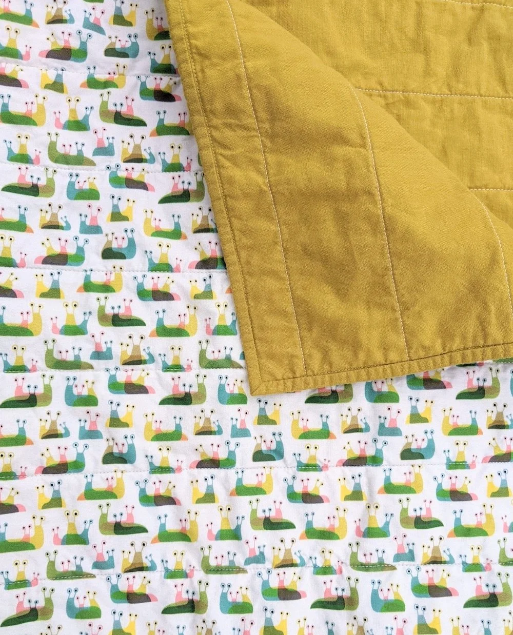 Slug Drama Baby Blanket (mustard)