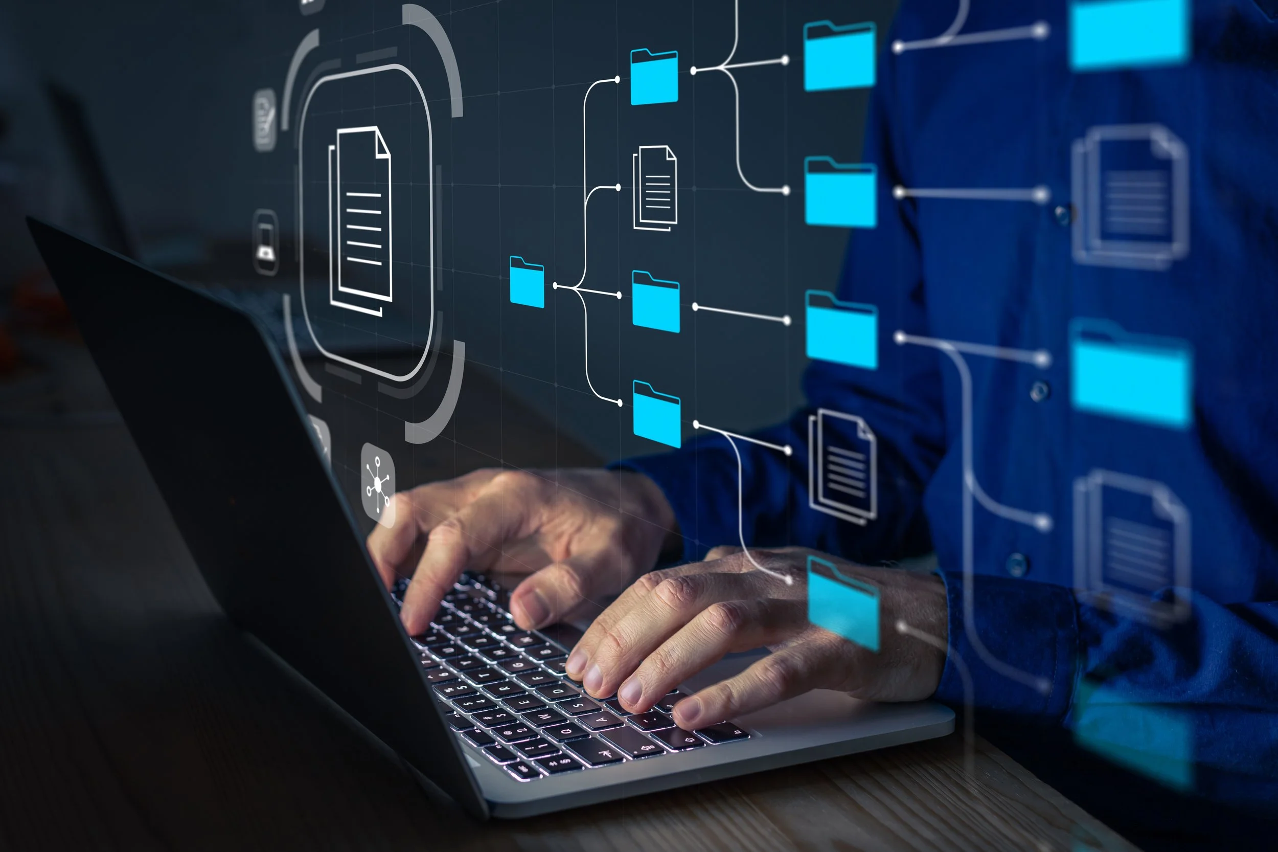 Person typing on a laptop with digital file and folder icons overlayed, representing data management or cloud storage.