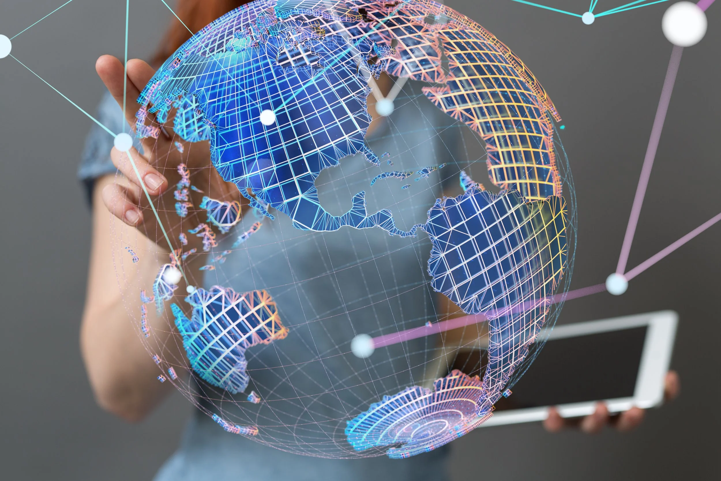 Woman interacting with digital globe and holding smartphone, representing global connectivity and technology.