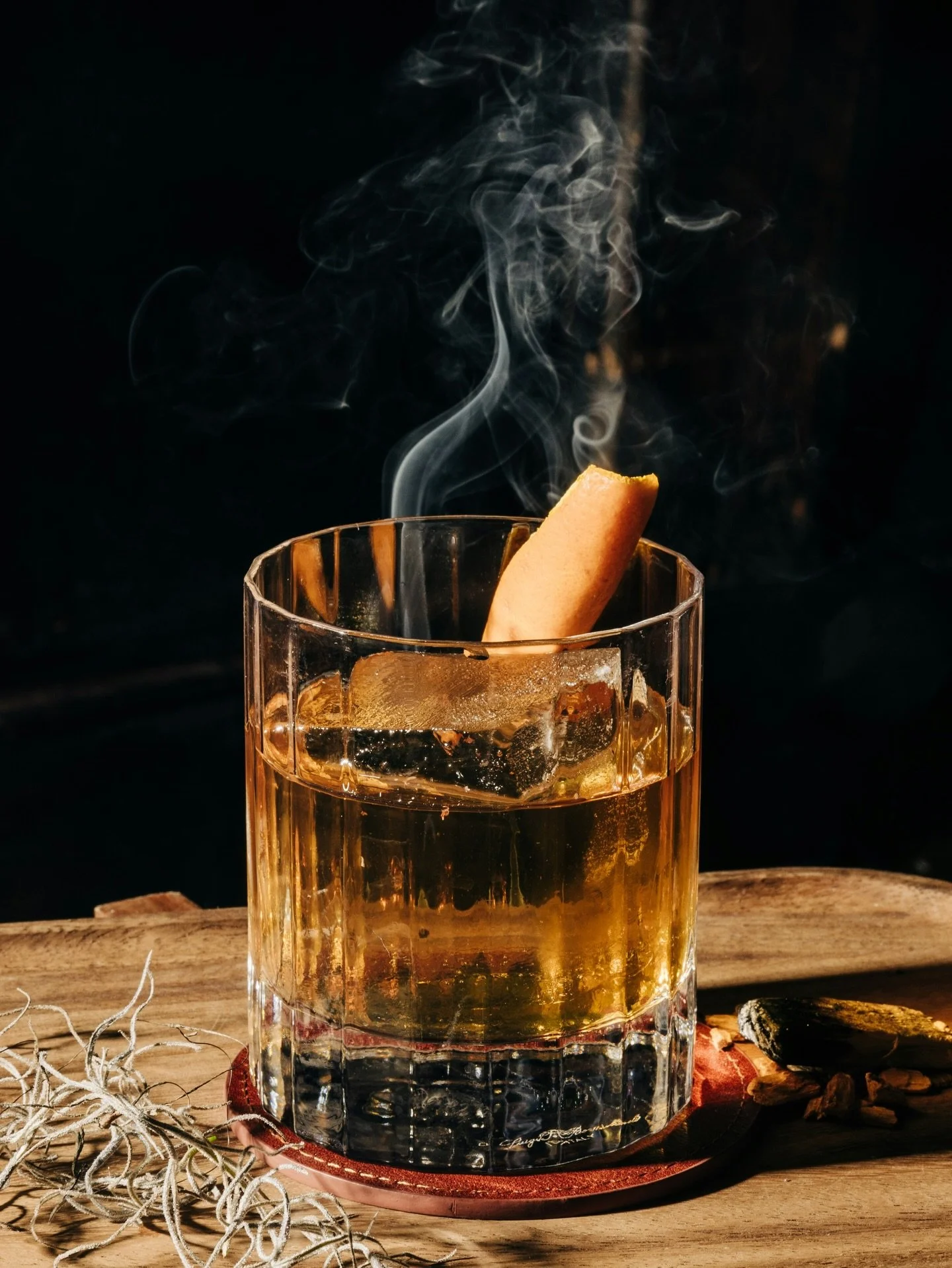 Gather around...

By The Campfire is a palo santo-smoked old fashioned made with @casalotos sotol, old forester 1920, flor del desierto cascabel and walnut bitters. An homage to the key role that sotol played during the Prohibition era.