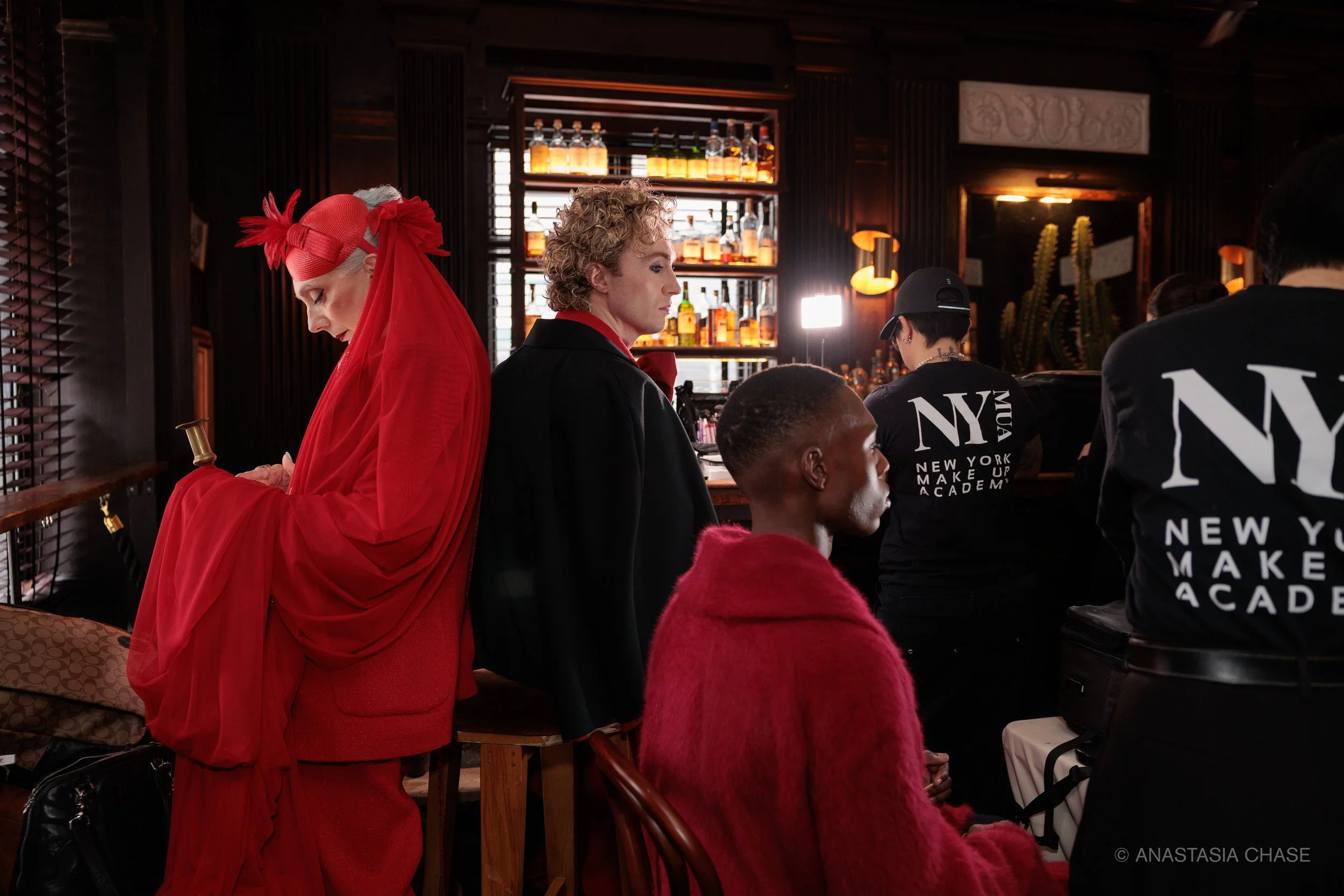 Behind the scenes moments of models getting hair and makeup done in Bar Calico before walking in the SIVAN fashion show for NYFW