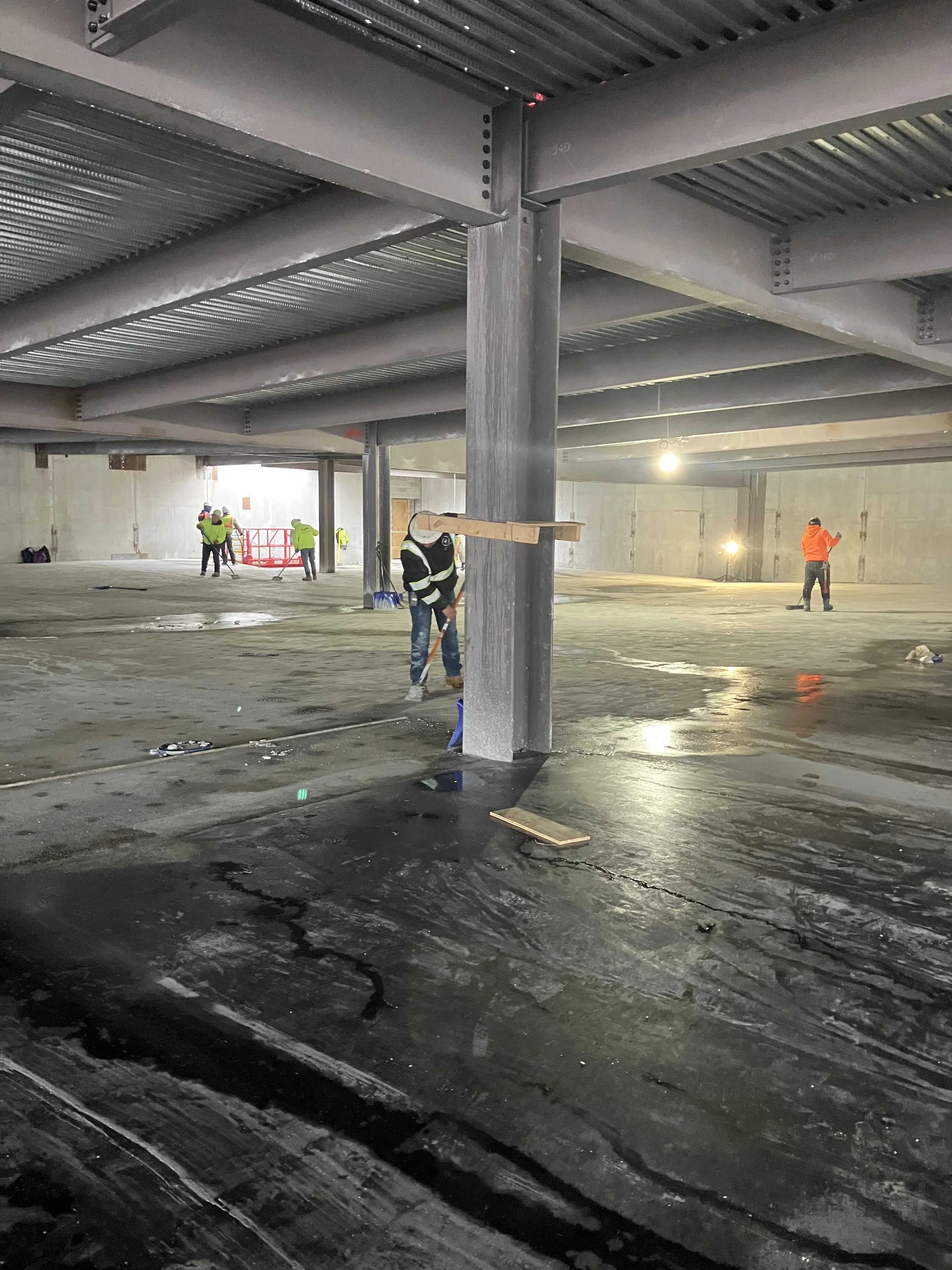 scrape and clean deck 1 after pour.JPEG