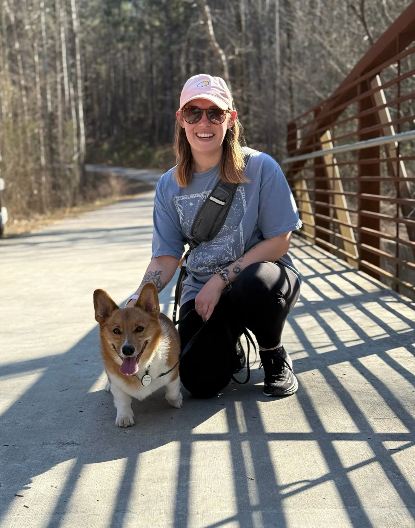 Aleah with her pembroke welsh corgi dog, Merlin, in the park