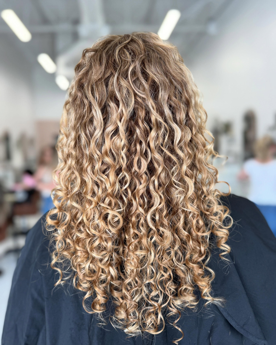Blonde Haircare Curly Hair Experts Fort Worth TX.png