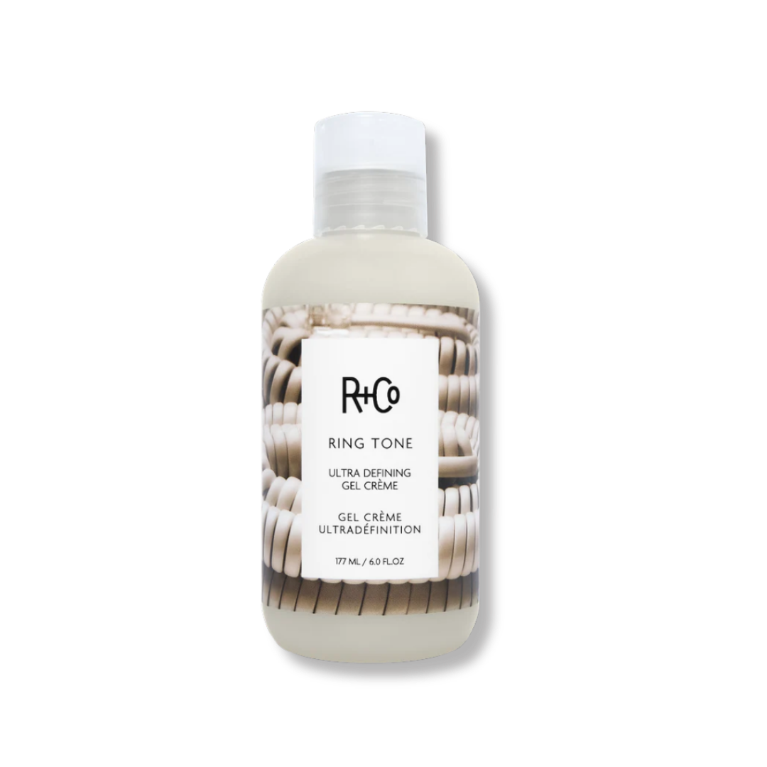 R+Co Ring Tone Ultra Defining Gel Crème bottle with a beige and brown coiled telephone cord design.