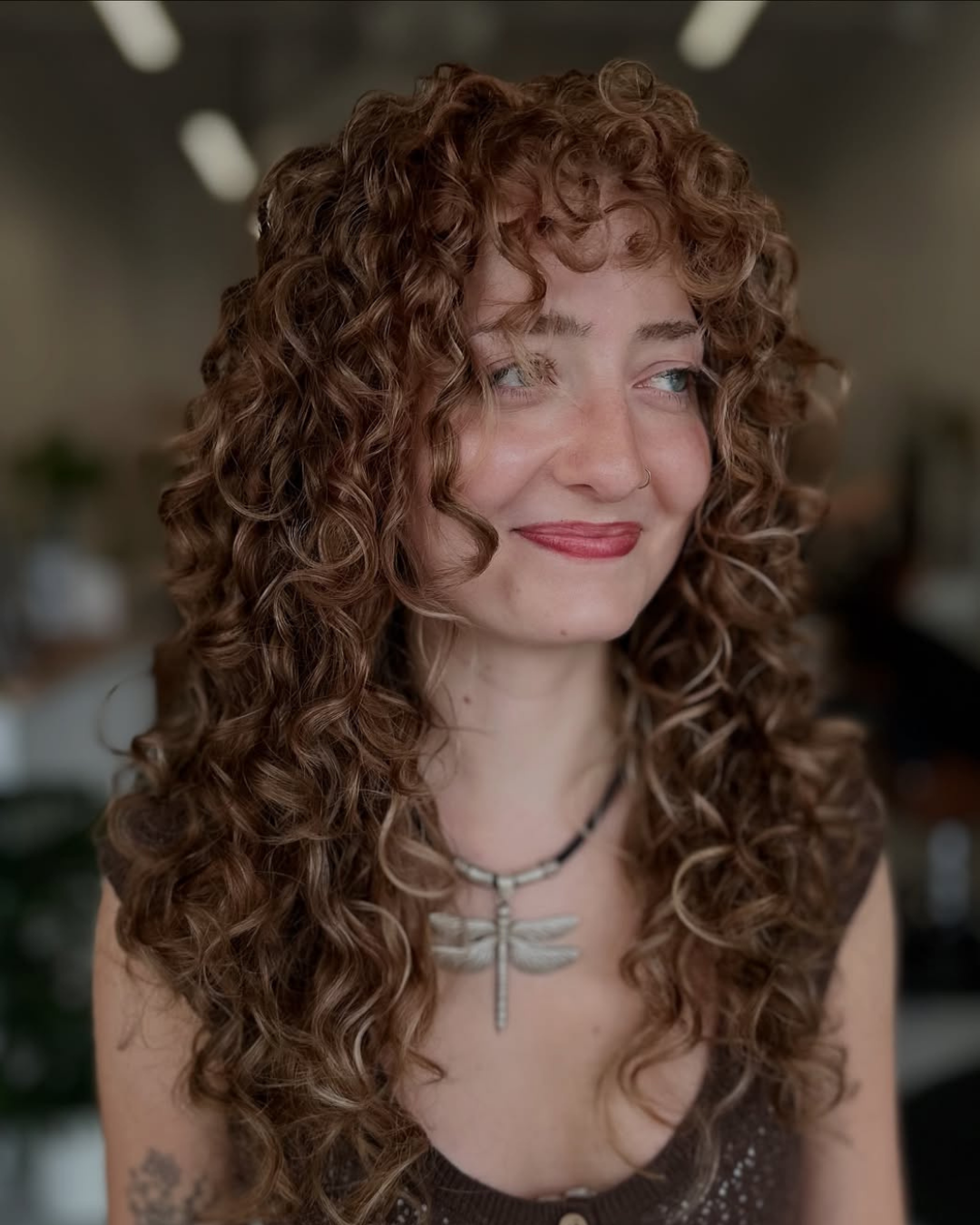 Curly Shag Haircut Fort Worth Salon.png