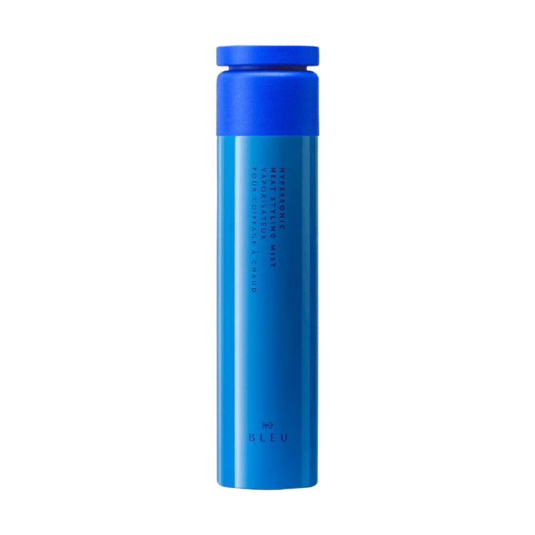 R+Co Bleu Hypersonic Heat Styling Mist in a royal blue bottle.