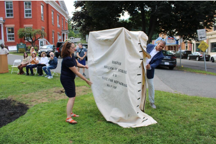 Great Barrington Town Manager Liz Hartsgrove and Dr. Lloyd unveil the Kiosk