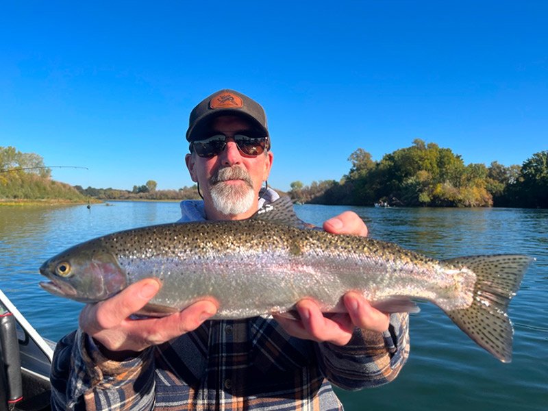 Man trout and steelhead fishing with a guide on the Sacramento River 